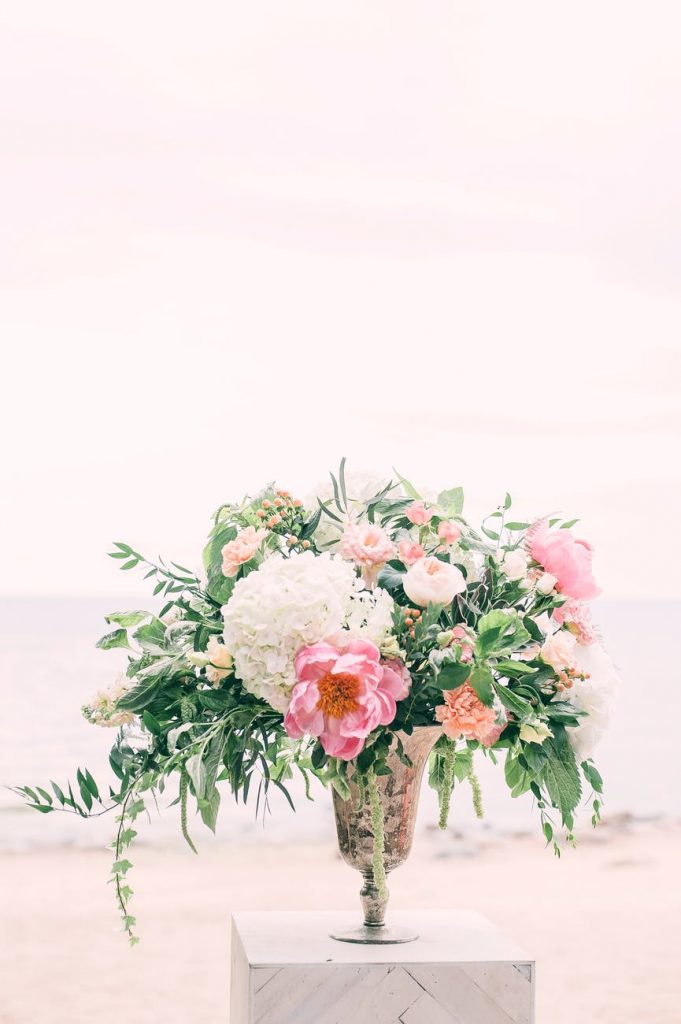 to save money, use the bridesmaid's bouquets as centerpieces
